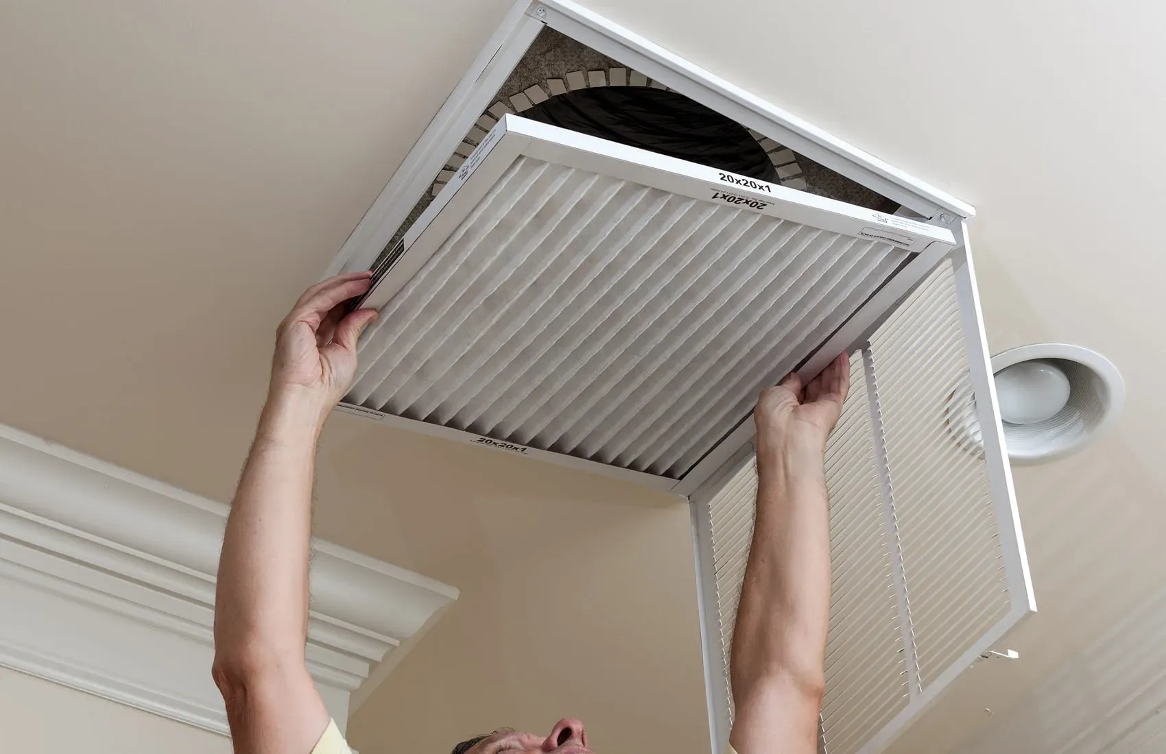 Rapid Response technician performing professional air filtration installation service