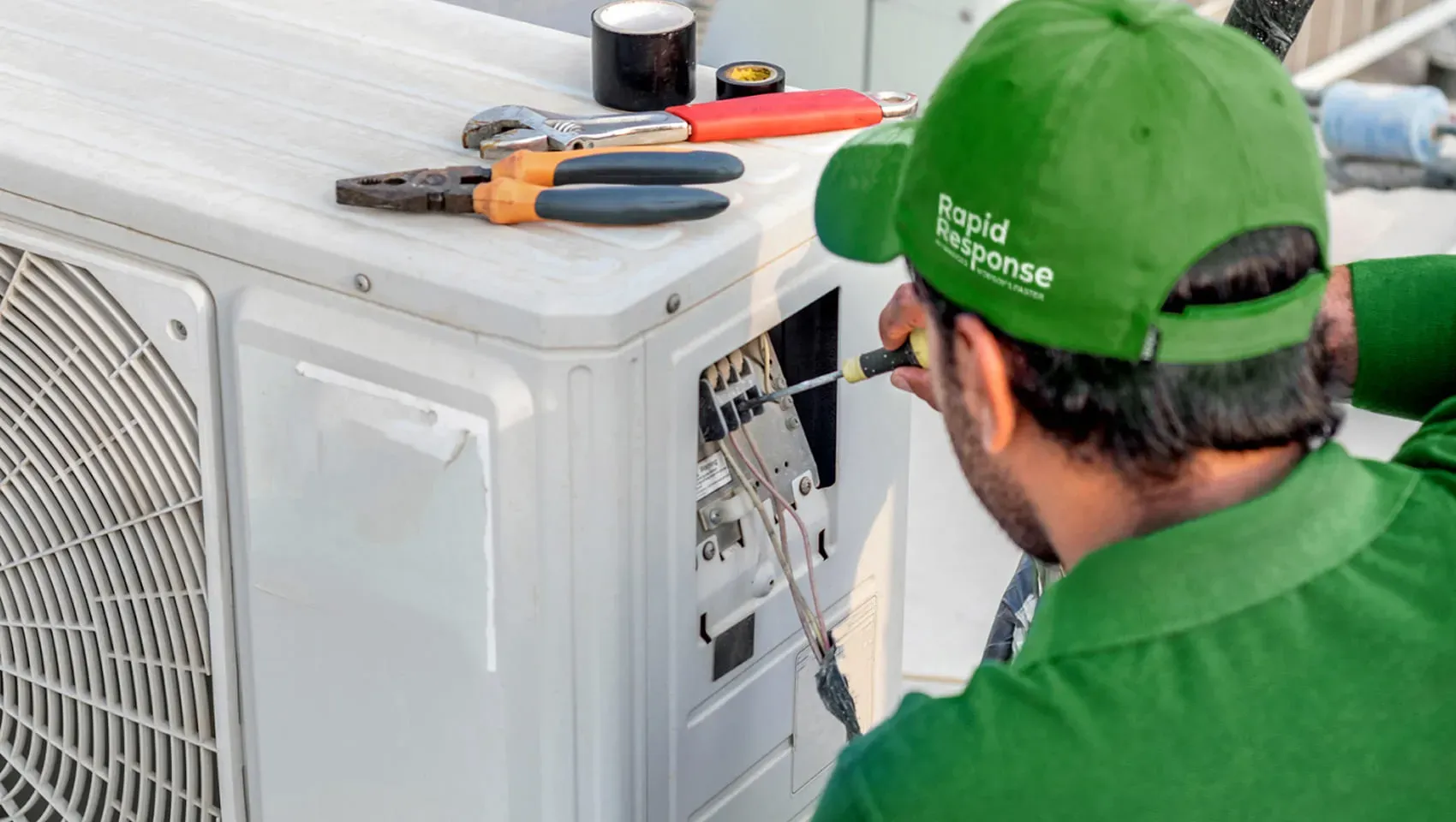Rapid Response technician performing AC installation in Cape Coral