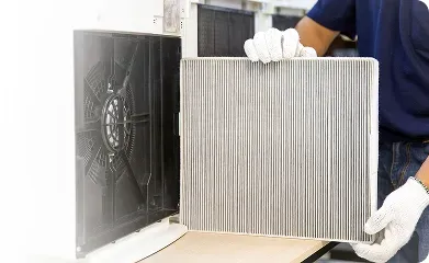 New air filter being installed